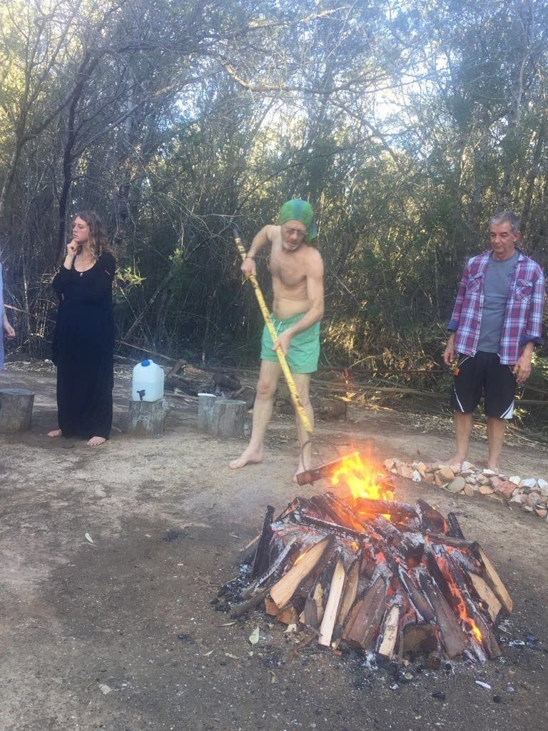 Nixiwaka tending the fire