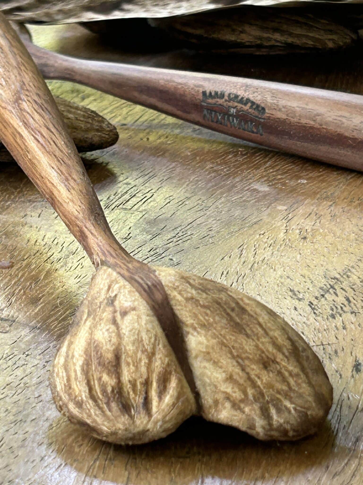 Close-up of the Nixiwaka hand-crafted brand stamp on the handle