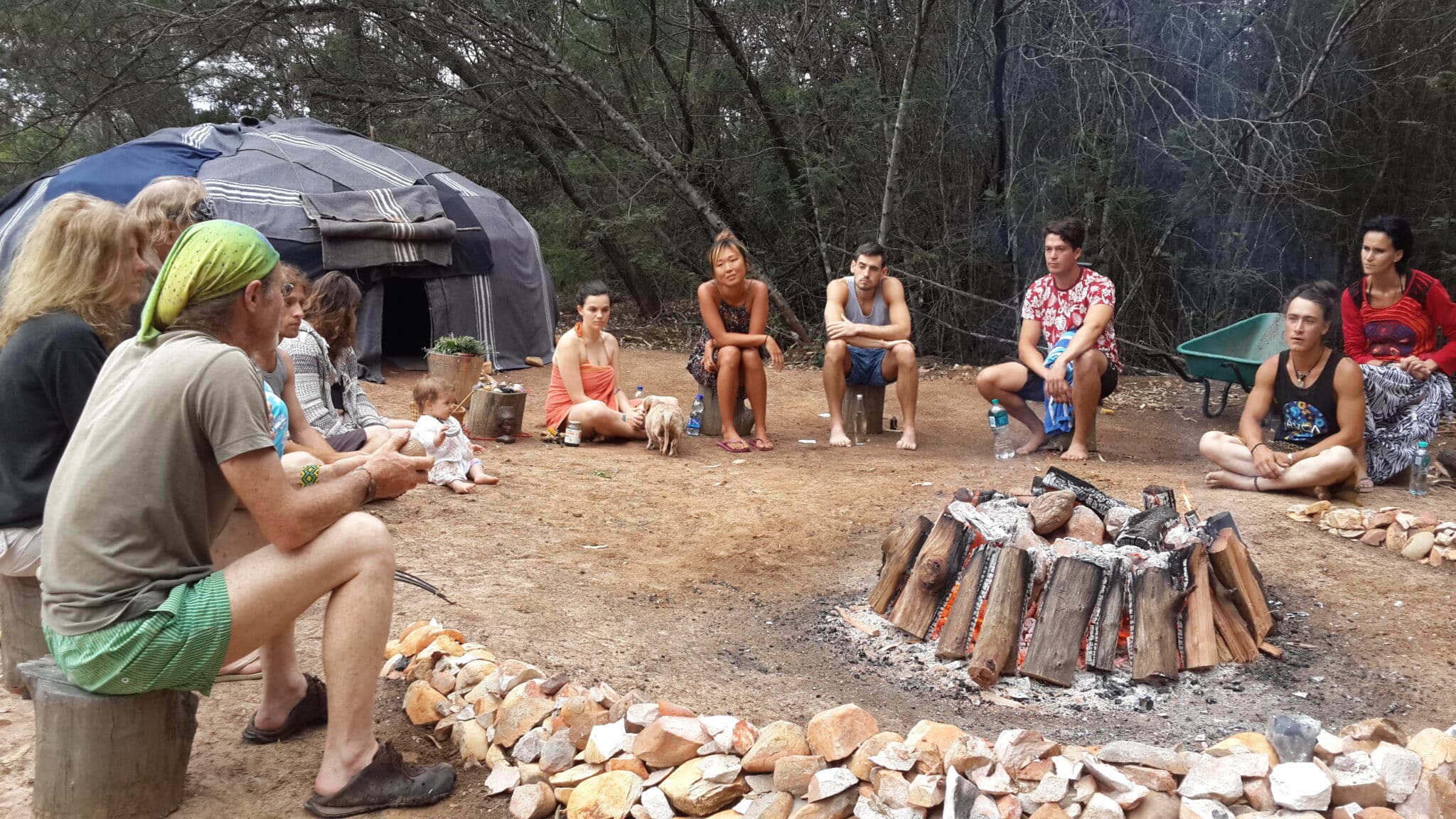 Sitting at the sweat lodge, facing the circle